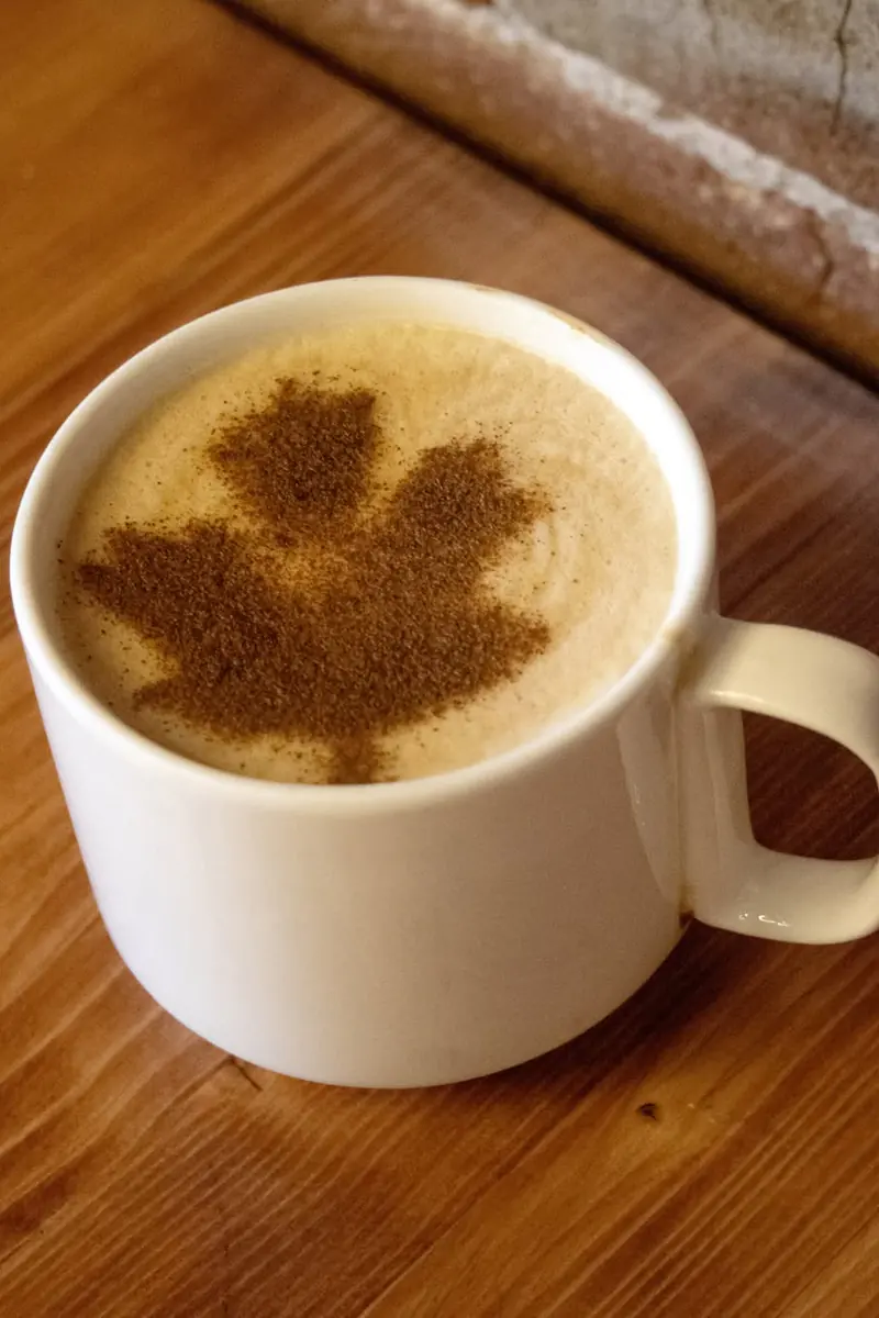 Salted Maple Latte with a maple leaf stenciled on the foam
