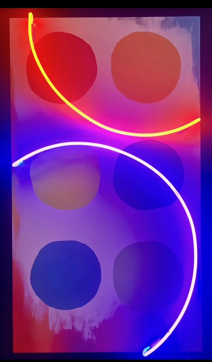 Damien Hirst is a Bully by Scott Young: two neon arcs over painted spots